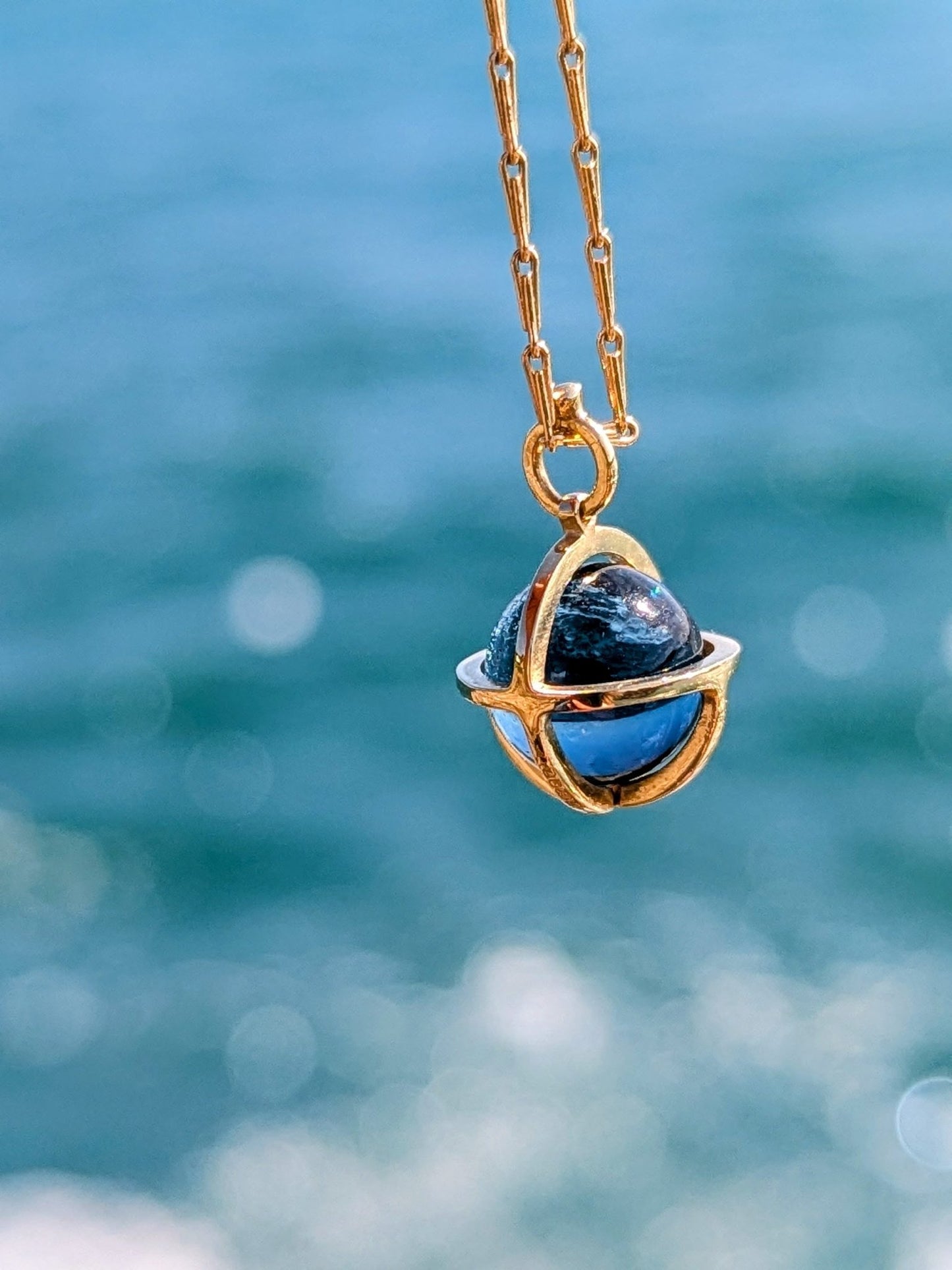 18 Carat Gold Necklace with London Blue Topaz Sphere – Drop of the OceanOcean - Inspired NecklacesBooblinka Jewellery