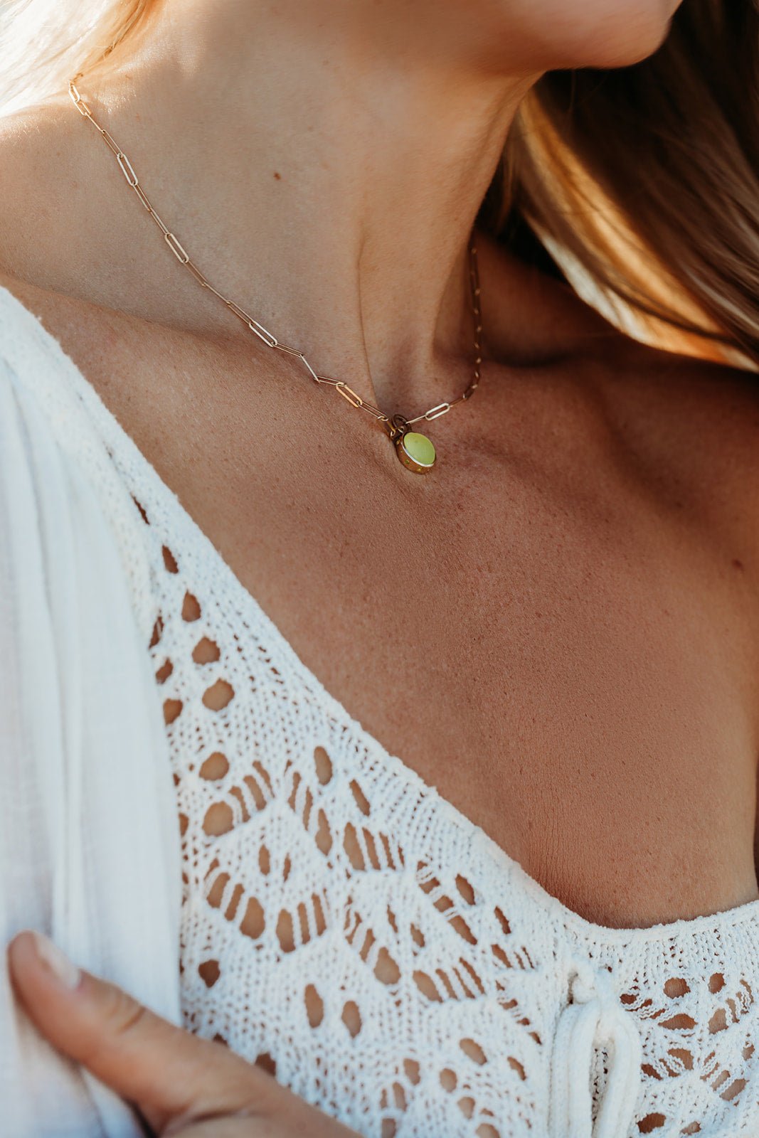 Model wearing Rare Yellow Sea Glass Paperclip Necklace in Solid 9ct Gold made by Booblinka Jewellery