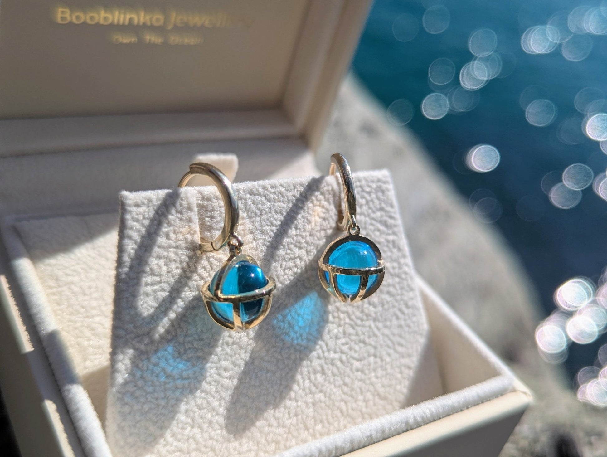 Swiss Blue Topaz Gold Hoop Earrings – Drop of the Ocean CollectionEarringsBooblinka Jewellery