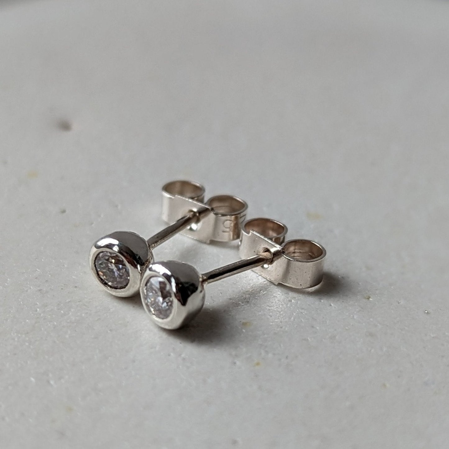 Side details of Moissanite Solitaire Silver Stud Earrings – DEI Collection by Booblinka Jewellery