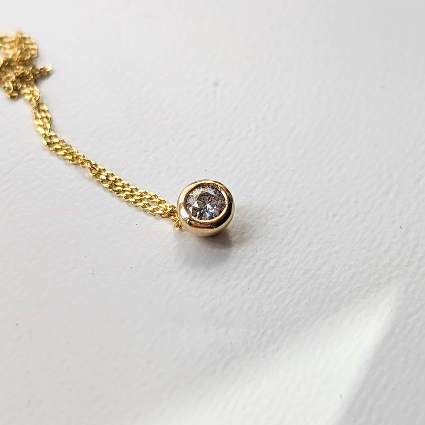 Detail of Gold Floating Moissanite Necklace – DEI Collection by Booblinka Jewellery