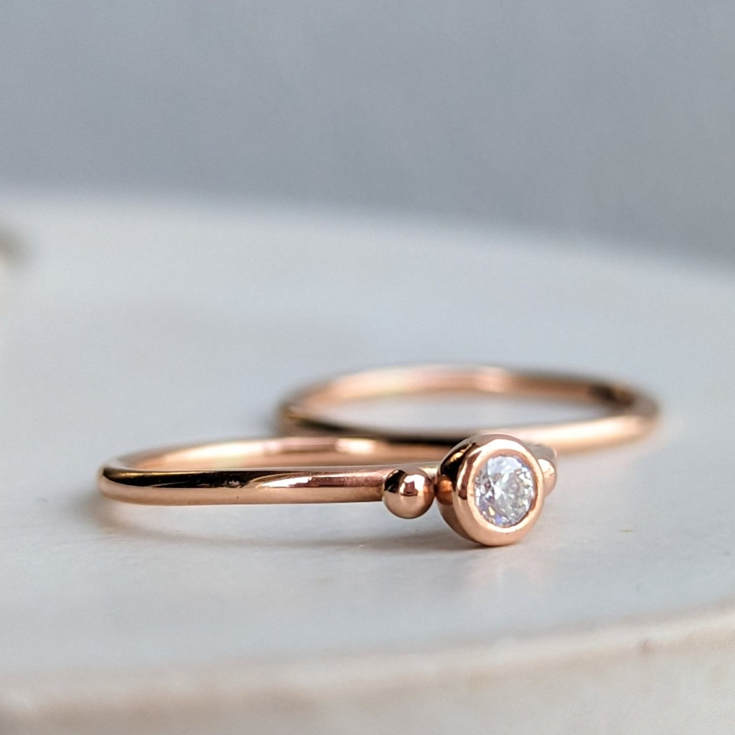 Side detail of Rose Gold Solitaire Moissanite Stacking Rings – DEI Collection by Booblinka Jewellery