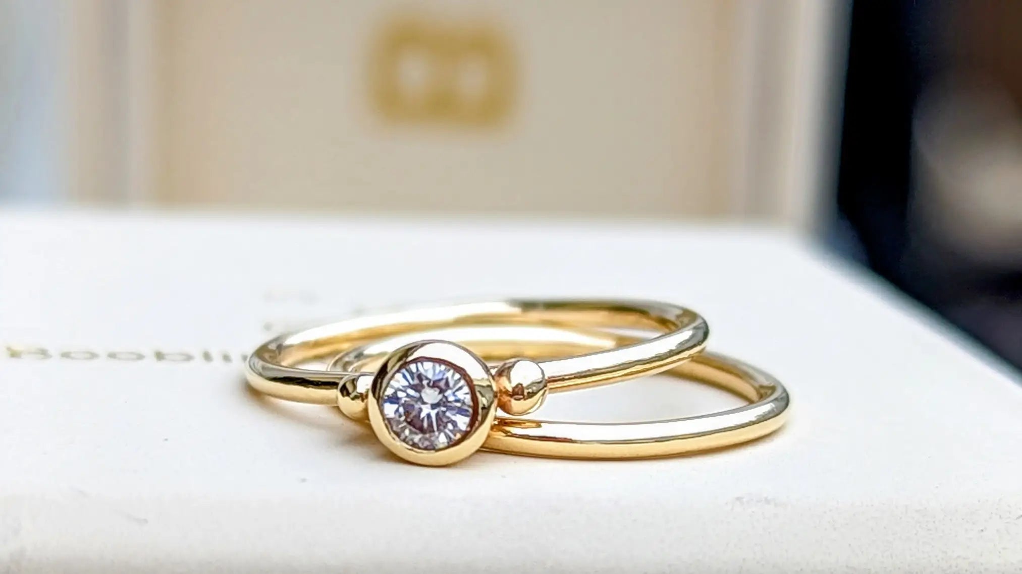 DEI gold stacking rings with moissanite by Booblinka Jewellery