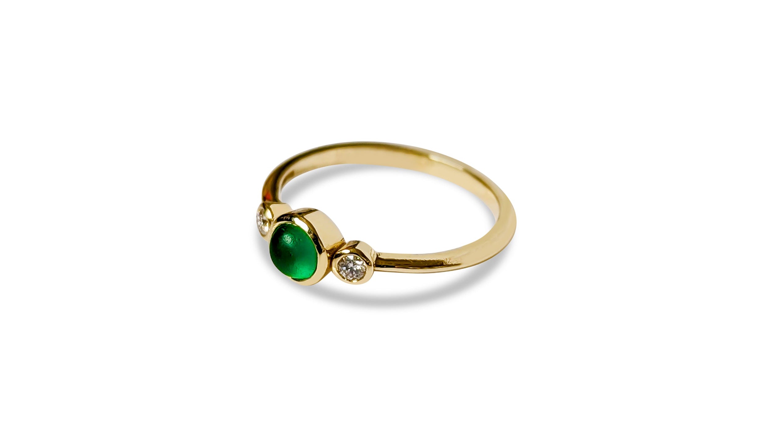 Gold engagement ring with a green sea glass and two ocean diamond on a white background made by Booblinka Jewellery