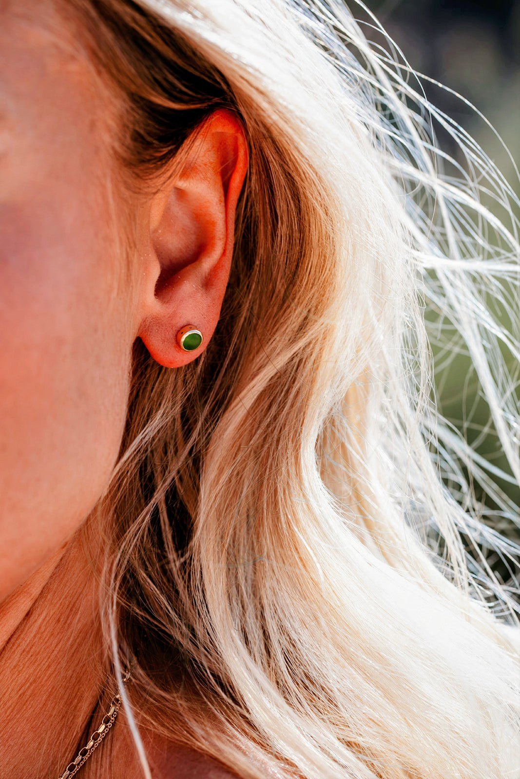 Model wearing Green Sea Glass Stud Earrings in 9ct Gold Earrings by Booblinka Jewellery
