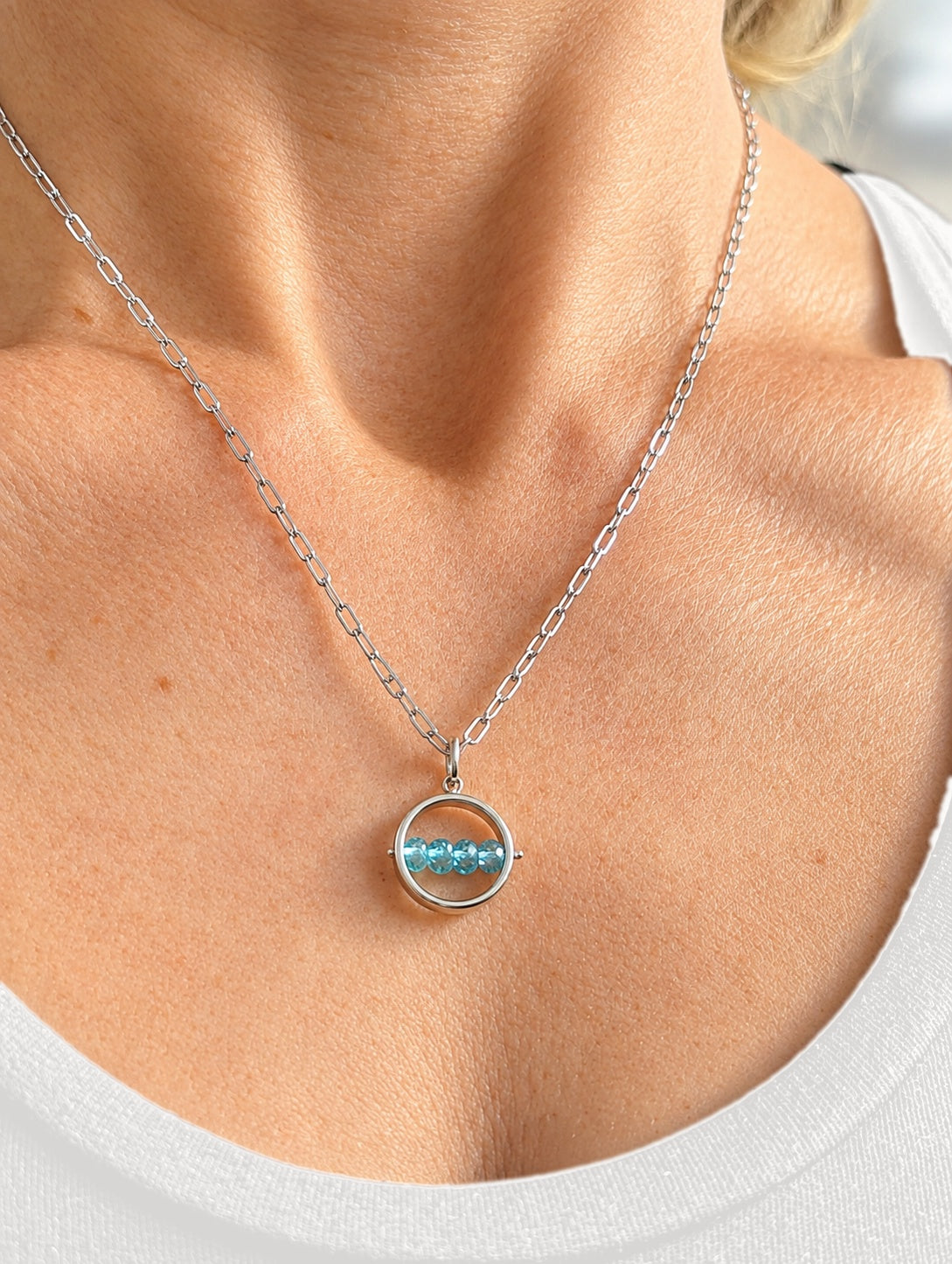HALO – 9ct White Gold Spinning Blue Topaz Necklace