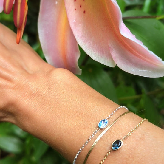 Swiss Blue Topaz Sterling Silver Bracelet 
 from Ocean Collection on a hand 