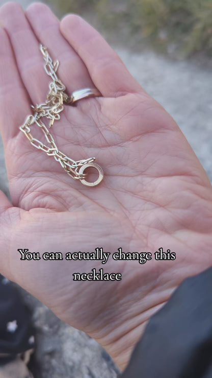 Video showing how the gold connector works - it is a hinged ring you can add different charms on a gold paperclip chain.