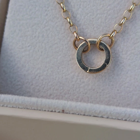 Video of gold chain with opening ring for pendants in an open jewellery box