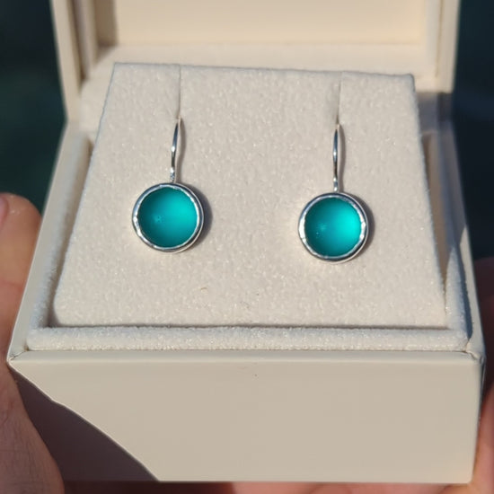 Video of Teal Sea Glass Drop Earrings in Sterling Silver in a jewellery box made by Booblinka Jewellery