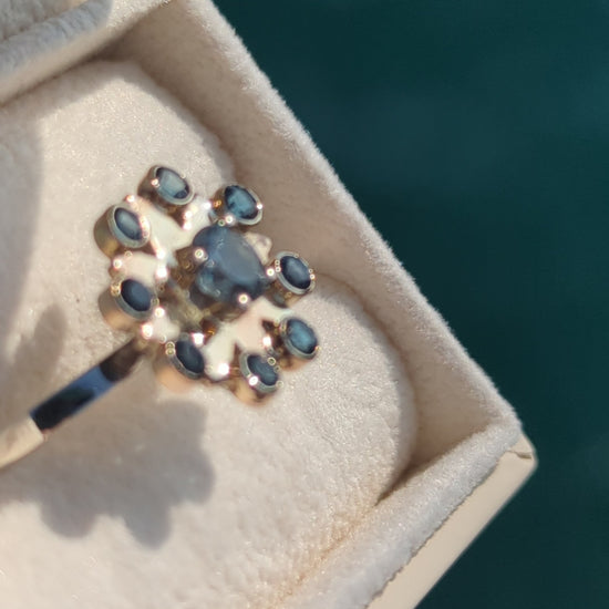 Cluster flower gold and silver Ring with blue Topaz gemstones in an ivory plush jewellery box made by Booblinka Jewellery