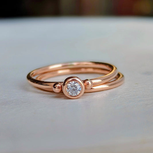 Detail of Rose Gold Solitaire Moissanite Stacking Rings – DEI Collection by Booblinka Jewellery