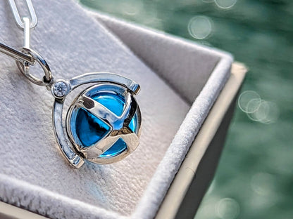 Silver Spinning Swiss Blue Topaz Necklace – ORBNecklacesBooblinka Jewellery