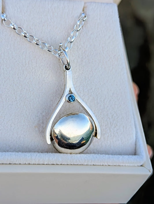 Spinning Minstrel Silver Necklace with London Blue Topaz – Ocean - Inspired JewelleryNecklacesBooblinka Jewellery