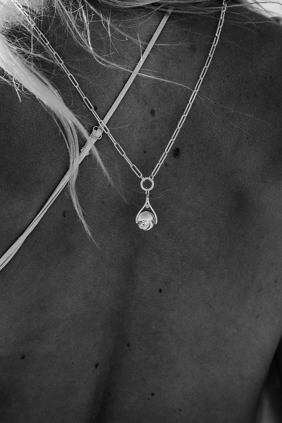 Spinning Minstrel Silver Necklace with London Blue Topaz – Ocean - Inspired JewelleryNecklacesBooblinka Jewellery