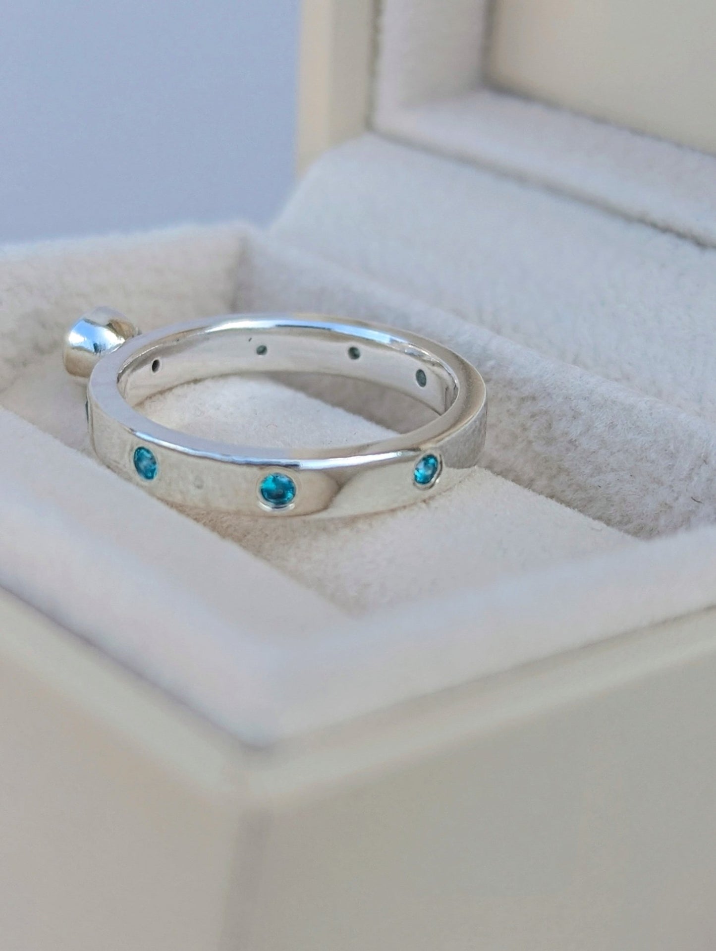 Sterling Silver Ring with Blue Topaz and Cubic Zirconia Set into the BandRingsBooblinka Jewellery