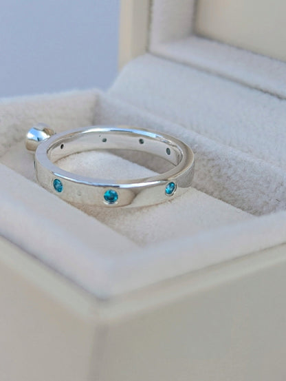 Sterling Silver Ring with Blue Topaz and Cubic Zirconia Set into the BandRingsBooblinka Jewellery