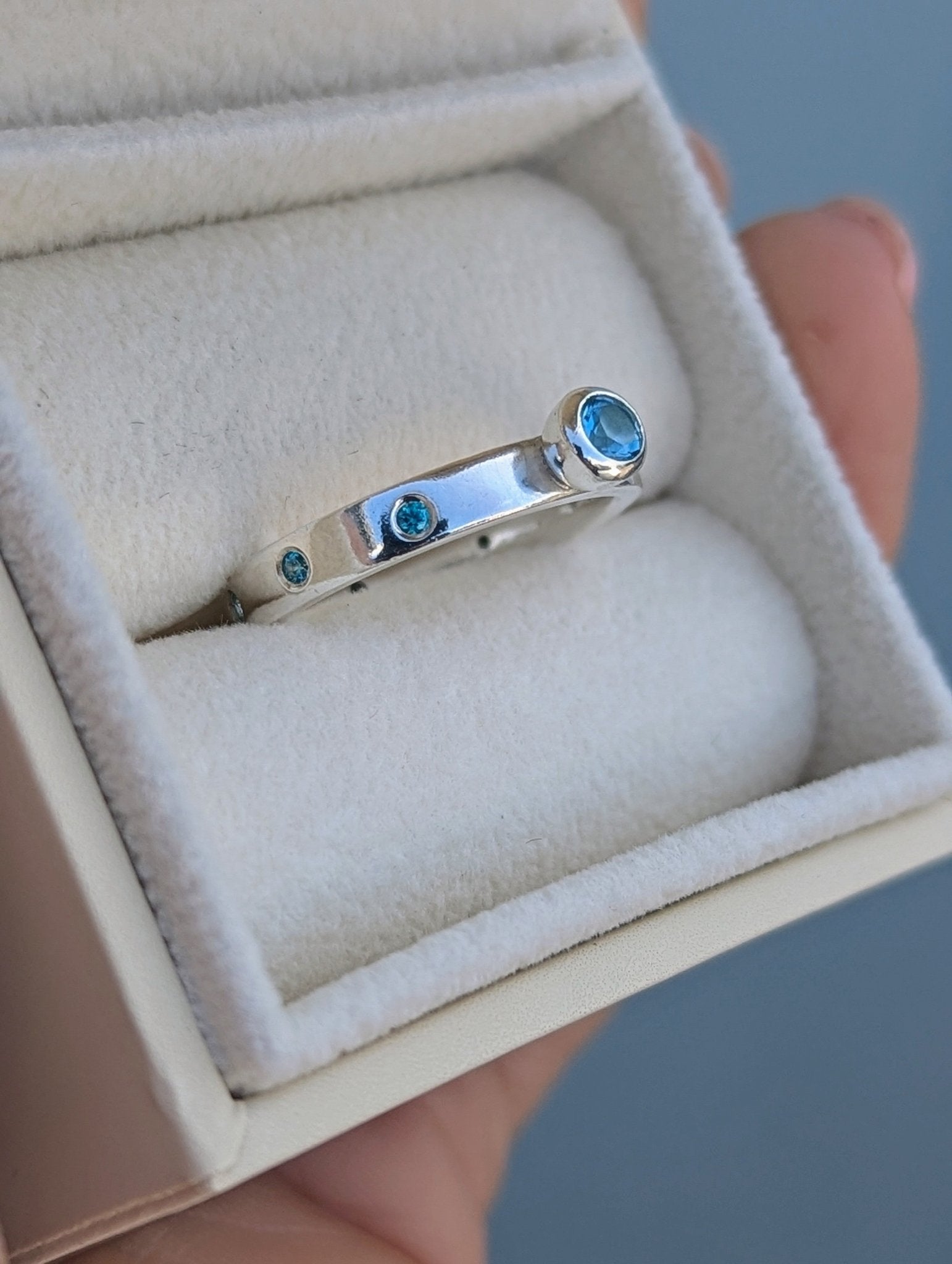 Sterling Silver Ring with Blue Topaz and Cubic Zirconia Set into the BandRingsBooblinka Jewellery