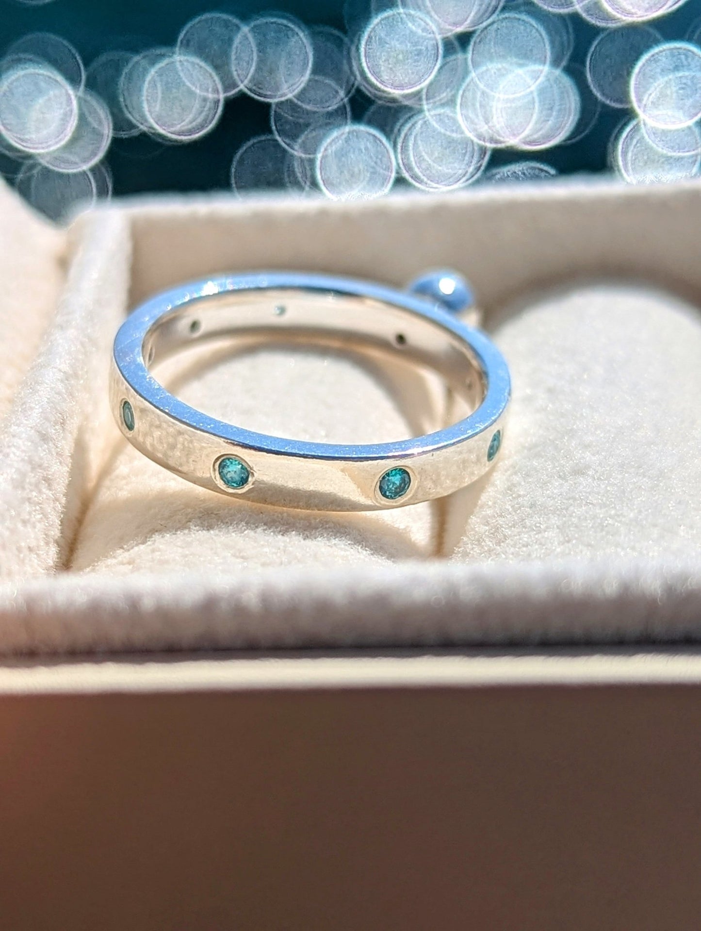 Sterling Silver Ring with Blue Topaz and Cubic Zirconia Set into the BandRingsBooblinka Jewellery