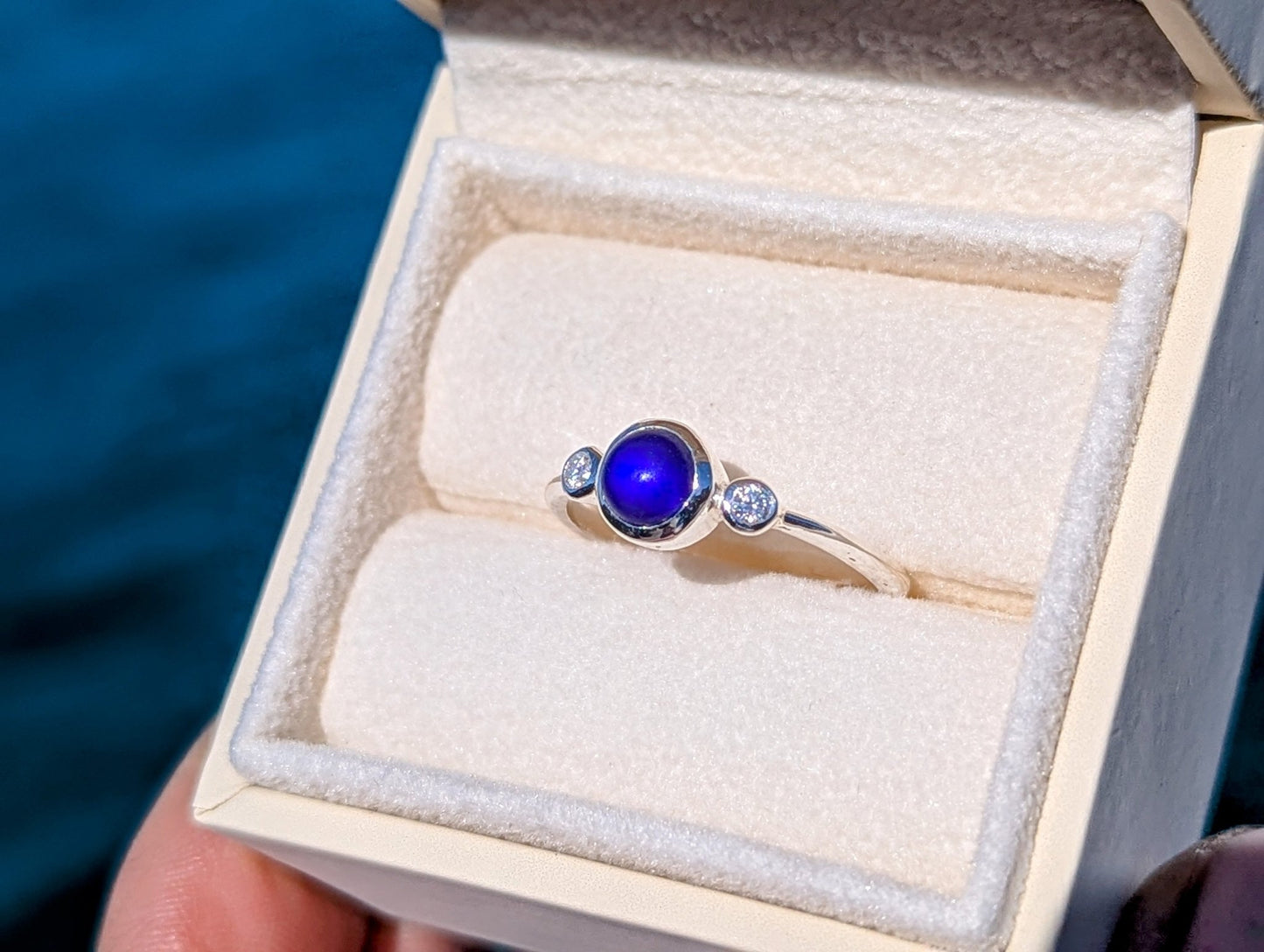 Sterling Silver Engagement Ring with Cobalt Sea Glass & Moissanites in an ivory plush jewellery box – Handmade in Cornwall by Booblinka Jewellery