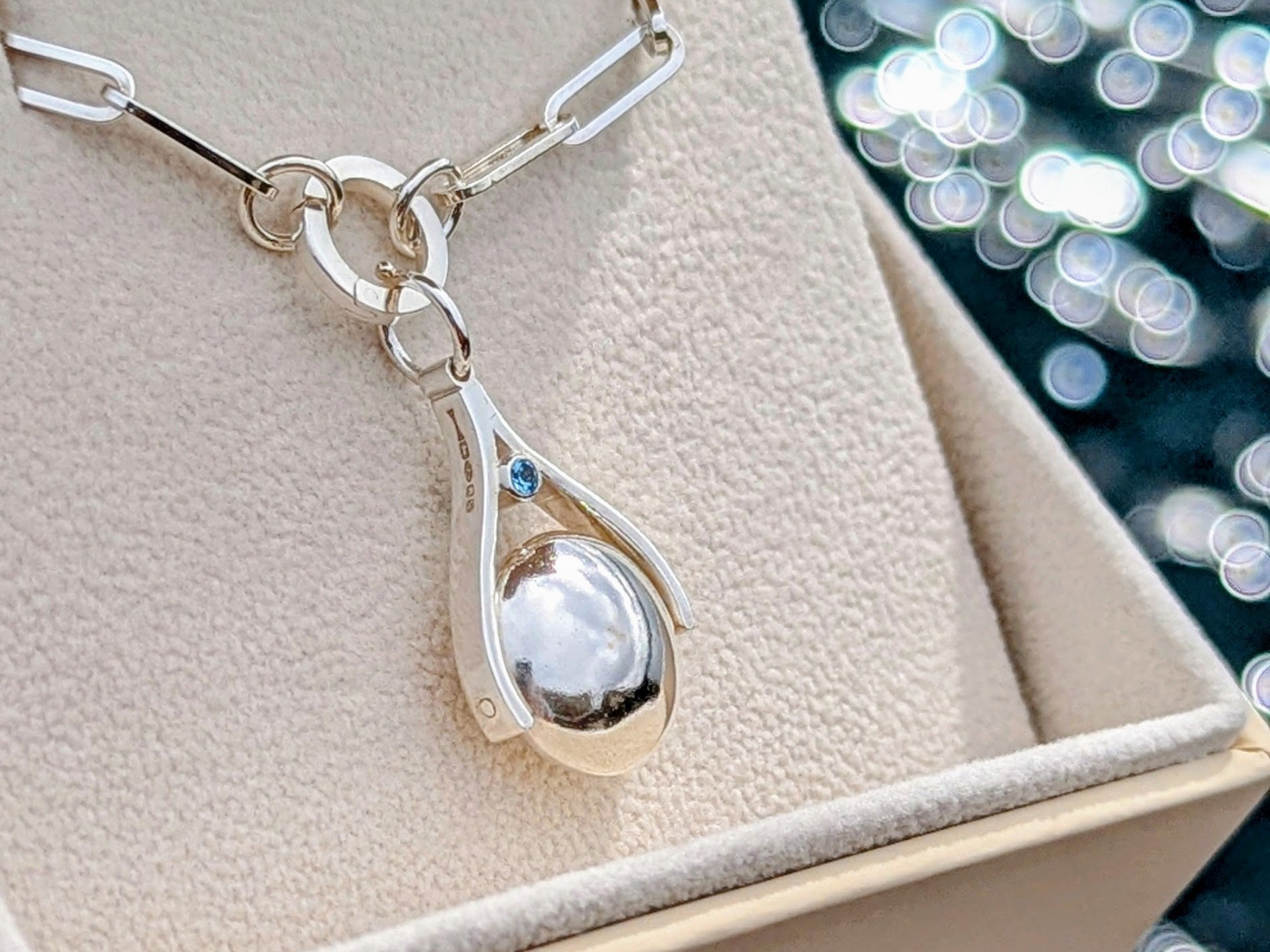 Sterling Silver Spinning Pendant Necklace with Blue Topaz – Made to OrderSpinning NecklacesBooblinka Jewellery