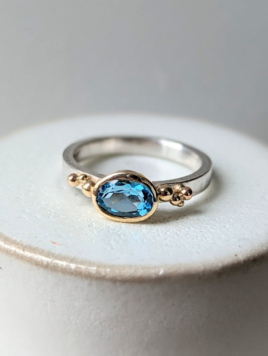 Gold and Silver Engagement Ring with oval Swiss Blue Topaz - Ocean Collection by Booblinka Jewellery