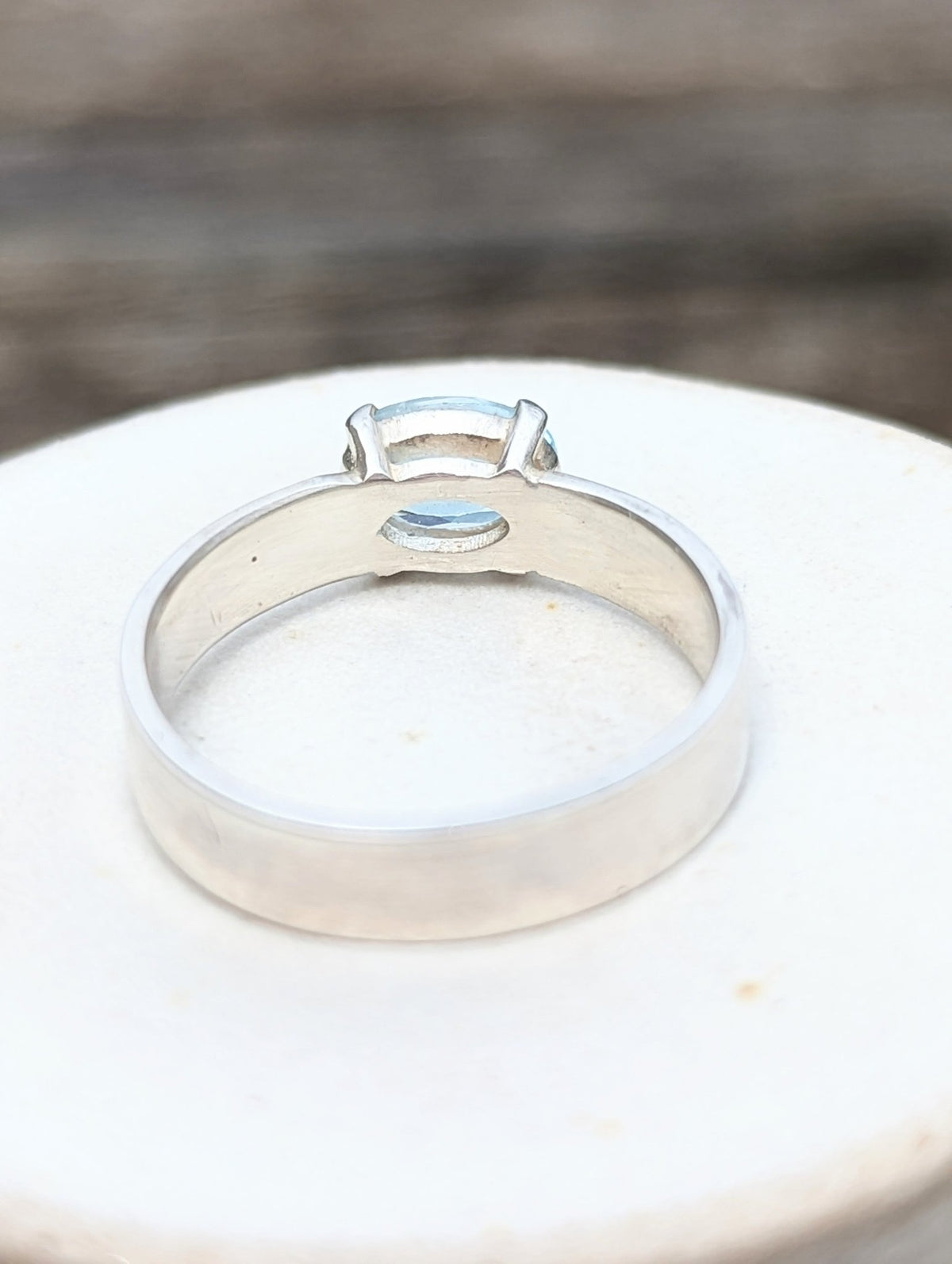 Sterling Silver Ring with Sky Blue Topaz in Claw Setting
