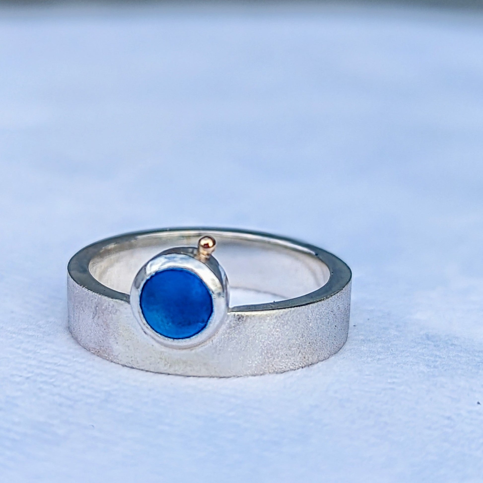 Solid silver chunky unisex ring with blue sea glass and satin finish