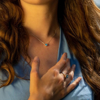 Handcrafted Daria Swiss Blue Topaz Necklace with 16-inch Sterling Silver Chain from Ocean Collection in Cornwall. Handcrafted with a 16-inch Sterling Silver Chain and a beautiful 5mm Topaz.