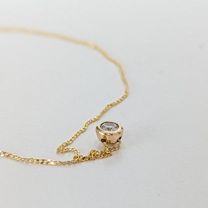 Gold moissanite dainty necklace from DEI Collection