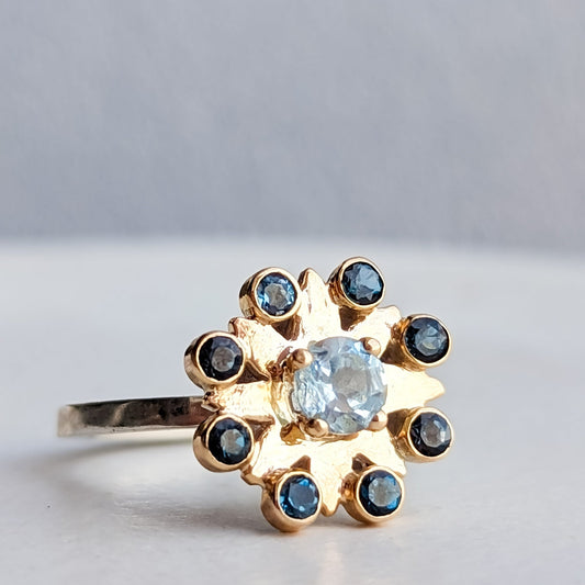 Flower Gold and silver cluster ring with sky blue topaz and London blue topaz ring by Booblinka Jewellery