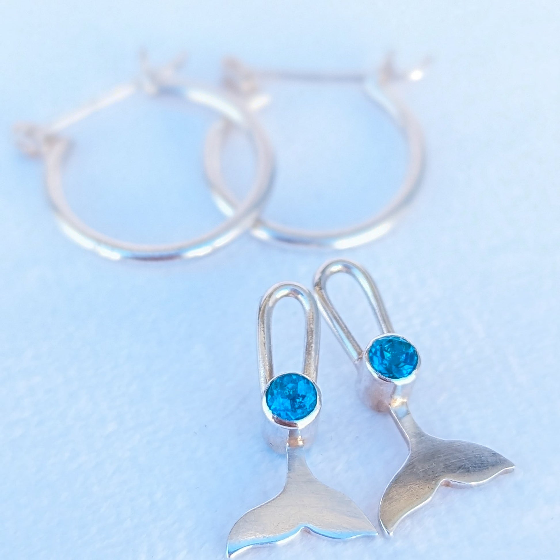 Silver hoop earrings with removable mermaid tails charms with Paraiba quartz by Booblinka Jewellery