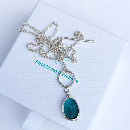 Teal oval sea glass silver necklace with nature design and satin finish with toggle clasp by Booblinka Jewellery