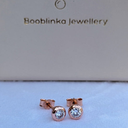 Rose gold moissanite stud earrings DEI Collection by Booblinka Jewellery