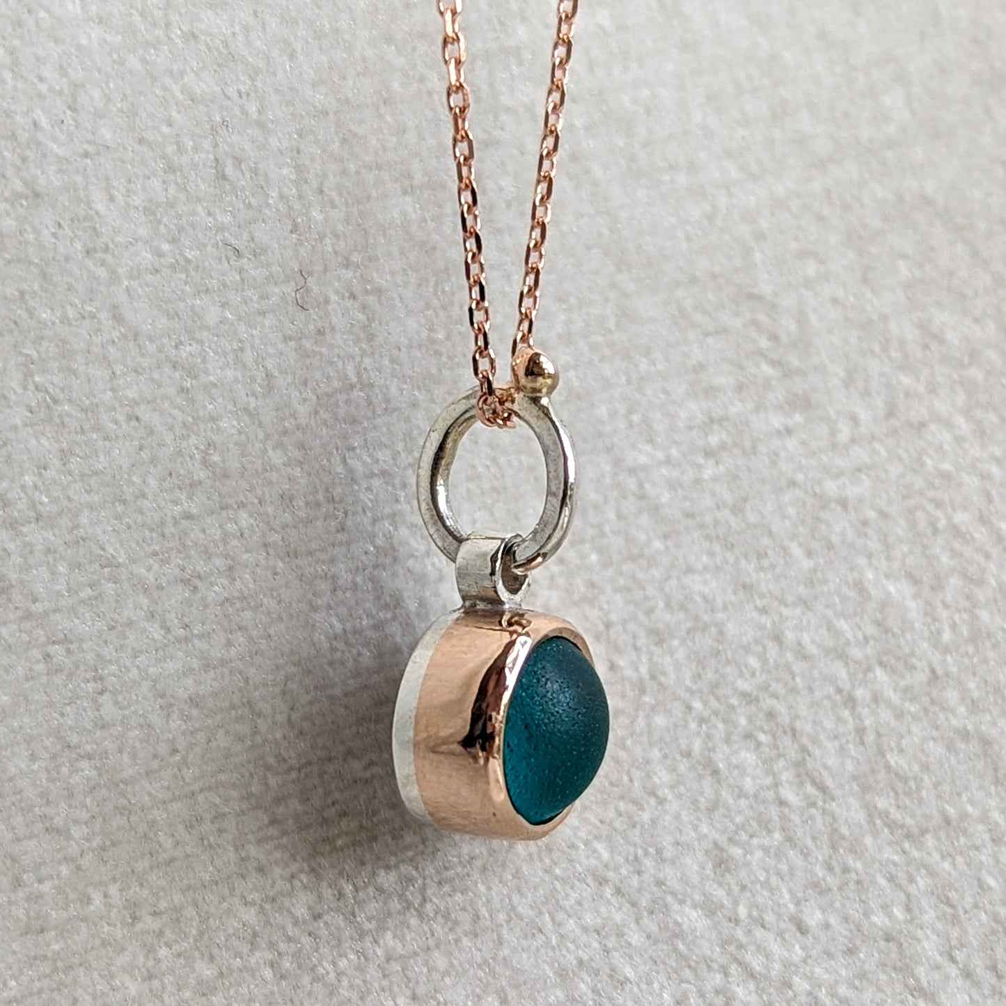 Rose gold necklace with round teal sea glass by Booblinka Jewellery