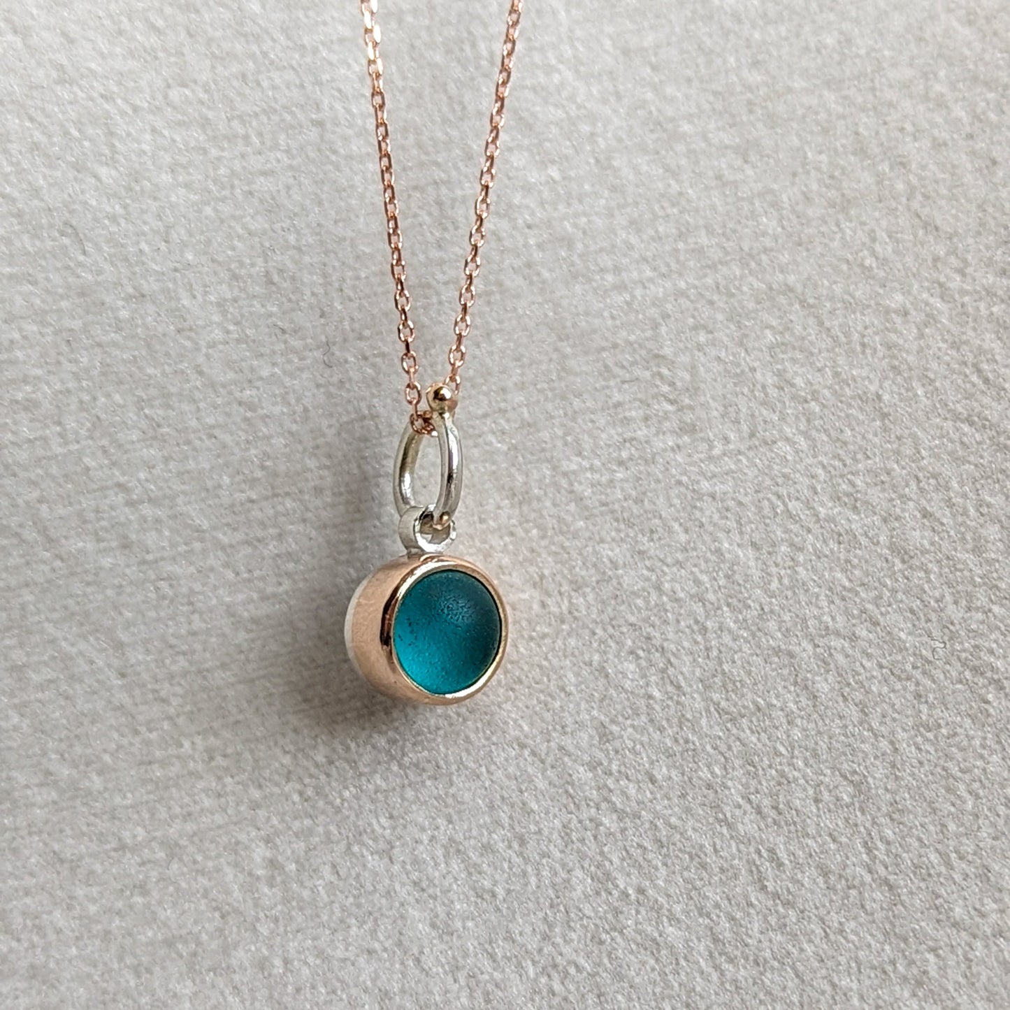 Rose gold necklace with round teal sea glass by Booblinka Jewellery