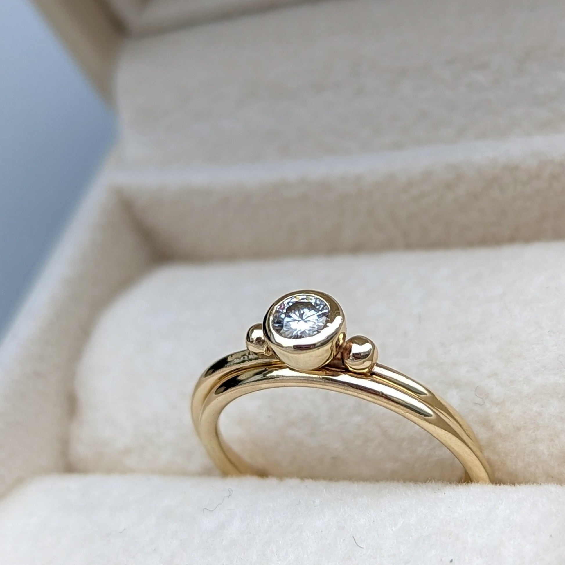 set of Engagement Solitaire Gold Rings with Moissanite in plush ivory box by Booblinka Jewellery